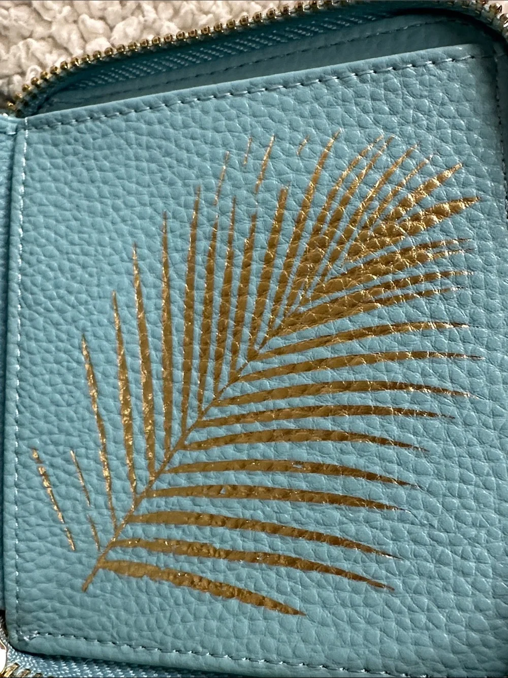 cleobella super cut turquoise  zip wallet, gold trim, tassel,cutouts design NWOT